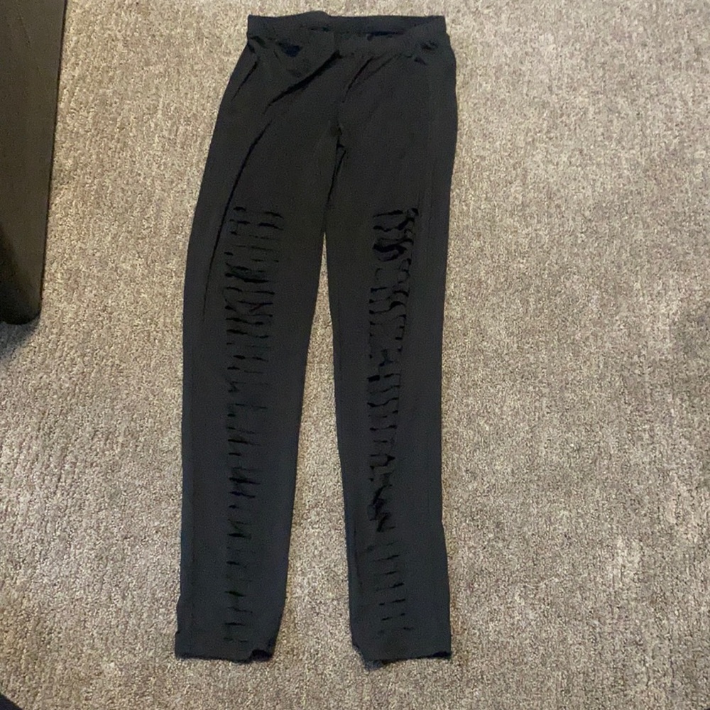 Ripped leggings. High waisted. Very comfortable for a cute look. Size Large.